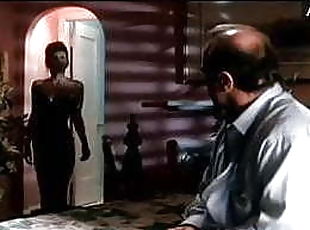 .C.  Webb in 1990 movie in black satin panties stockings