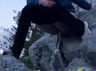 Pissing Outdoors Off a Cliff