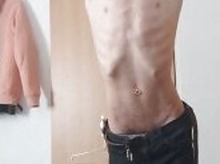 Extremely skinny teen shows off his skinny body and waist while wearing skinny jeans