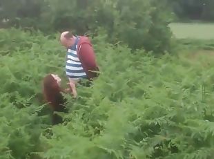 Busty wife jerks off a stranger in a field