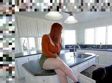 Red-haired MILF Lauren Phillips treats a boy to her lady bits