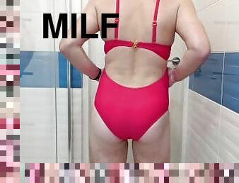 Crossdresser on sexy red one piece swimsuit