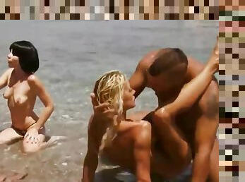 Kinky Group Fucking On The Beach