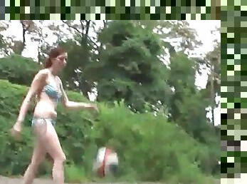 Redhead teen takes a facial in the woods