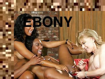 Blonde-haired GILF in stockings having fun with two ebonies