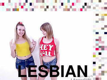 Cute Lesbian Teenies hump with strap on in studio