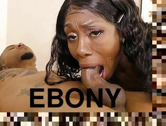 Ebony MILF gagging on black cock
