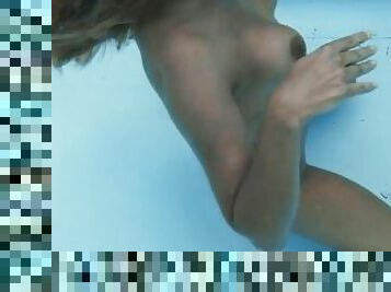Half Russian and Spanish chick Irina Cage nude swimming