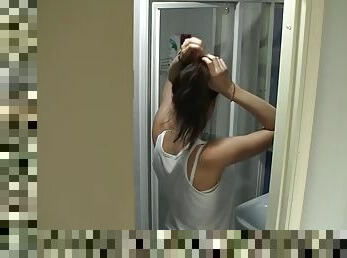 Sexy teen in the shower goes solo