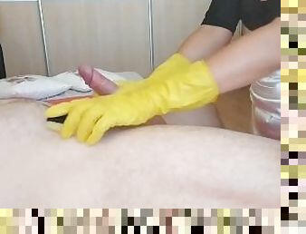 Cleaning the cock in yellow household gloves - teaser