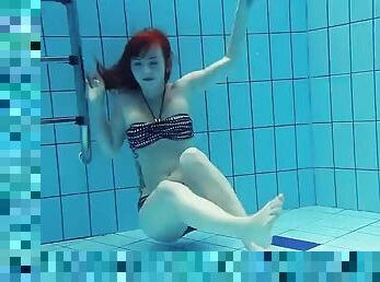 Katrin with big tits bounces and swims underwater