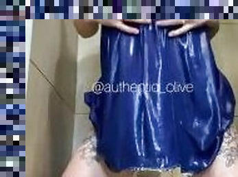 WAM girl showering in clingy dress and leather jacket