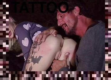 Tattooed slut deeply fucked in the camp