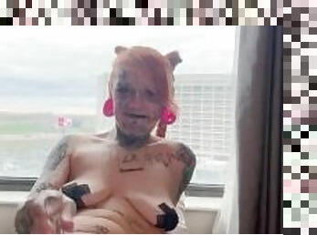 Tattooed Latina masturbates in window