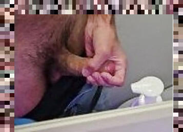 Stroking my cock in the airplane toilet. I couldn't resist!
