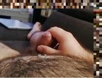 Moaning gay cub cums while watching porn