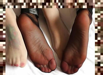 Two Girls Playing With Their Nylon Feet
