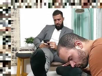 Handsome bearded businessman foot licked and worshipped