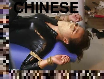 Chinese Meets Ropes In Catsuit