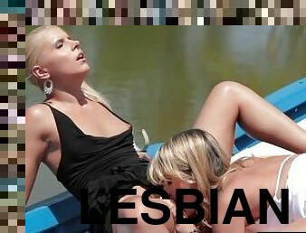 Stunning blondes enjoy lesbian sex on a lake