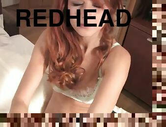 Stunning redhead teen shows her sexy body in a solo scene