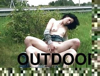 Brunette girl sucks and fucks outdoor beside the road