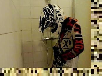 18 years Old boy take a shower in MX gear and jerk off