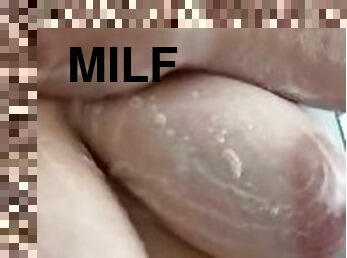 Soaping up my big milf tits makes my huge nipples so hard