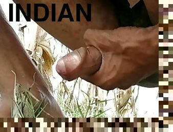 Cumshot in field on outside_Handjob_Indian big cock