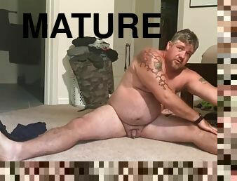 Naked dad bod stretching