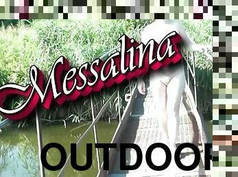 Messalina Dressed in Sun. Outside Outdoor. Nude Milf walks by bridge River. Naturist Nudist Woman