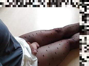 Sissy in pantyhose and skirt with handless no touch orgasm shooting cum on herself