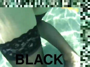 Black stockings and anal beads in the sea