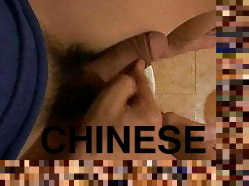 Chinese boy poking his big dick