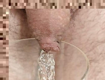 Close up cock piss