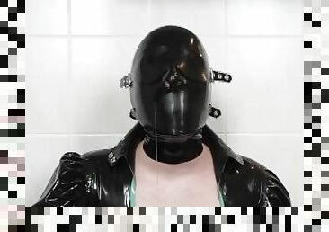 Spitting fun with latex mask, costume and gloves - Saliva mess on shiny rubber clothing (TRAILER)