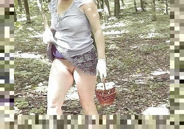 Upskirt no panties . Naked mommy Milf without panties picks mushrooms in forest . Outdoors Outside