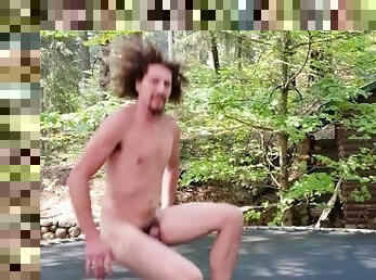 naked man jumping on a trampoline, tricks and bouncing balls