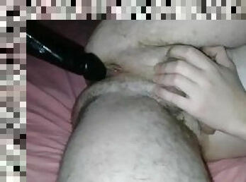 Playing with my ass and a big black dildo till I cum