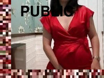 Hot brunette in red dress masturbates in a public restaurant