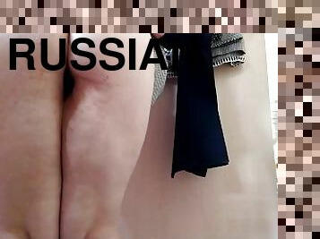OMG! Russian mommy trying on skirts in a fitting room in a shopping mall
