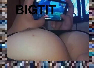 playing video games on my cell phone while my stepbrother touches my big tits