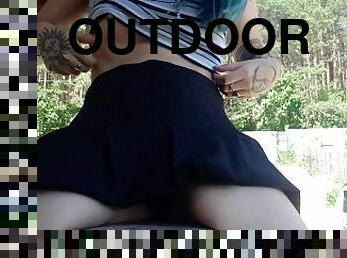 Tattooed teen girl outdoor play with her pussy