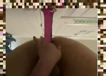 Ducking dildo against the door