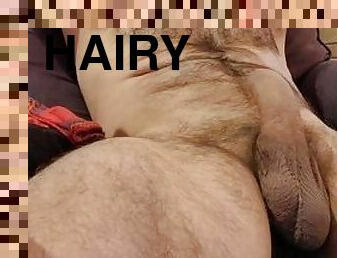 Close up of HAIRY MUSCLE BEAR STROKING COCK