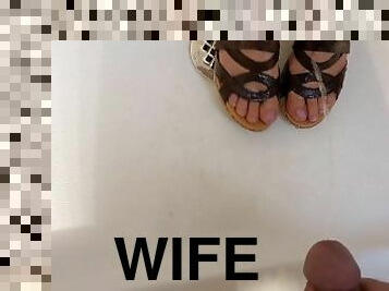 Peeing on wife's feet while wearing heals