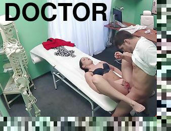 Frisky brunette sucks doctor's cock and gets fucked during a check-up