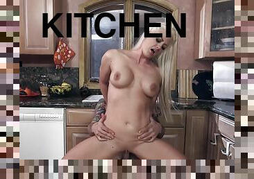 Blonde slut Holly Heart gets eaten out and shagged in the kitchen