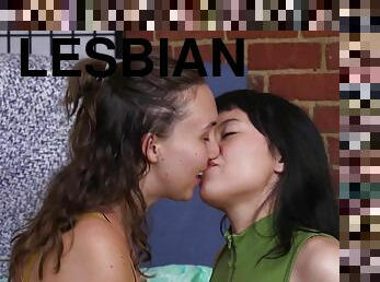 Dark-haired lesbians Jean and Olive G fucking passionately in bed
