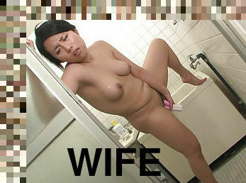 Cute looking housewife Mikage Sakata masturbates in the shower